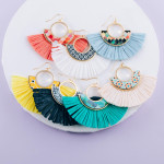 Wholesale metal drop earrings wood inspired pattern accent tassel details
