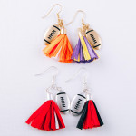 Wholesale raffia tassel drop earrings silver metal football accent