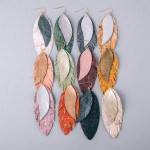 Wholesale double layered feather inspired earrings cork metallic details