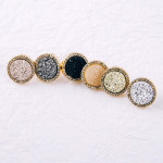 Druzy disc stud earrings with cubic zirconia accents. Approximately .5" in diameter.