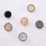 Druzy disc stud earrings with cubic zirconia accents. Approximately .5" in diameter.