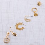 Wholesale gold starburst huggie hoop earrings