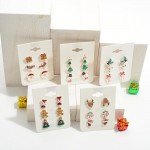 Christmas stud earring set featuring three pairs. 

- Approximately .5" in size.