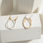 Metal Tone Tear Drop Earrings

- Approximately 1.5" Length