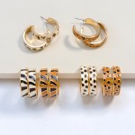 Gold Tone Animal Print Enameled Hoop Earring

- Approximately 1" Diameter