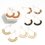 Wholesale teardrop earrings Ivory colored ellipsoid wood beads gold circular bea