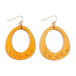 Oval Wooden Drop Earrings With Metal Beaded Accent 

-Approximately 2"L
-Lightweight Material 