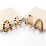 Animal Print Leather and Gold Tone Statement Hoop Earrings

- Approximately 2.25" Diameter