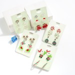 Set of Three Christmas Earrings Featuring "Joy" and Present Studs and Twisted Metal Hoops.

- Approximately .5" - 1" W