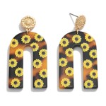 Acetate Sunflower Print Arch Drop Earrings Featuring Gold Tone Sunflower Stud Accents.

- Approximately 2" L