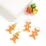 Metal and Enamel Gingerbread Man With Reindeer Antlers Drop Earrings.

- Approximately 1.5" L