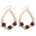 Wood Beaded Teardrop Earrings Featuring Animal Print Beads 

- Approximately 2" L 