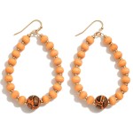 Beaded Teardrop Earrings Featuring Snakeskin Print Beads

- Approximately 2.5" L