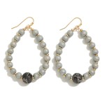 Beaded Teardrop Earrings Featuring Snakeskin Print Beads

- Approximately 2.5" L