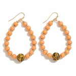 Beaded Teardrop Earrings Featuring Snakeskin Print Beads

- Approximately 2.5" L