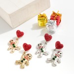 Metal Gingerbread Drop Earrings Featuring Rhinestone Heart Accents.

- Approximately 1.5" L