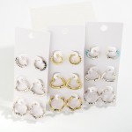 Set of 3 Drop Hoop Earrings Featuring Heart, Wave, and Stone Accents
 
- Approximately 0.5"-0.75" L