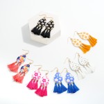 Teardrop Resin Flower Drop Earrings Featuring Tassel Detail

- Approximately 2.75" L