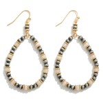 Beaded Teardrop Earring With Metallic Bead Accent

- Approximately 2.25" L