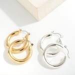 Chunky Brass Hollow Hoop

- Approximately 1-2.25" L
- Genuine Premium Brass Hollow Hoop
- Hypoallergenic 
 
