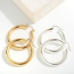 Chunky Brass Hollow Hoop

- Approximately 1-2.25" L
- Genuine Premium Brass Hollow Hoop
- Hypoallergenic 
 
