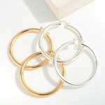 Chunky Brass Hollow Hoop

- Approximately 1-2.25" L
- Genuine Premium Brass Hollow Hoop
- Hypoallergenic 
 
