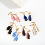 Gold Dipped Cubic Zirconia Drop Earrings Featuring Teardrop Stone

- Approximately 1" L
- 14K Gold Dipped 
- Handmade In Korea 