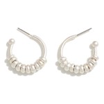 Metal Hoop Earring With Tapered Beaded Details

- Approximately  0.75" L