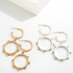 Worn Linked Circular Drop Earring With Fixed Bead Detail

- Approximately 2" L