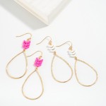 Dainty Gold Tone Teardrop Earrings With Wood Chevron Details

- Approximately 2.75" L