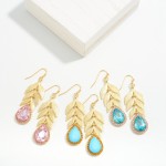 Gold Tone Leaf Drop Earrings With Teardrop Rhinestone Detail

- Approximately 2.5" L