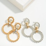 Twisted Metal Drop Earrings With Two-Tone Detail

- Approximately 1.75" L