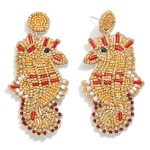 Seed Bead Seahorse Drop Earrings

- Approximately 3" L