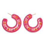 Seed Bead Flower Hoop Earrings With Woven Raffia Border

- Approximately 2" D