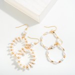 Circular Drop Earring With Flat Pearl And Gold Details 

- Approximately 2.25" L