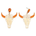 Western Gold Tone Laser Cut Bull Skull and Roses Drop Earrings With Rhinestone Accents

- Approximately 2.5" L