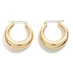 Tapered Hollow Brass Hoop Earring

- Genuine Hypoallergenic Brass 
- Approximately 30mm L 