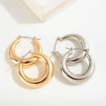 Tapered Hollow Brass Hoop Earring

- Genuine Hypoallergenic Brass 
- Approximately 30mm L 