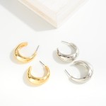 Tapered Metal Hoop Earrings

- Approximately 1" D