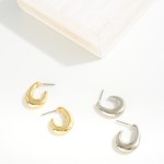 Simple Metal Curl Huggie Hoop Earrings

- Approximately .5" D