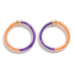 Glitter Filled Tube Hoop Earrings

- Approximately 2" L