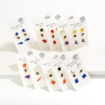 Set of Three Enamel Football Stud Earring Set

- Approximately 0.5-0.75" L