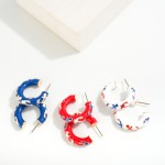 Enamel Coated Metal Hoop Earrings With Glitter Anchors

- Approximately 1" D