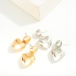 Metal Tone Puffy Heart Drop Earrings

- Approximately 1" L