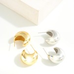 Gold Dipped Post Drop Hoop Earrings


- Brass Base
- Hypoallergenic
- Approximately .75" D
- Made in Korea