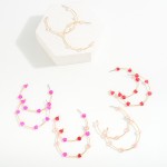 Wire Hoop Earrings With Valentine's Day Heart Bead Stations

- Approximately 1.75" D