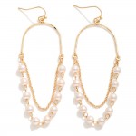 Long Metal Half Oval Drop Earrings Featuring Chain Link and Pearl Accents

- Approximately 3" L