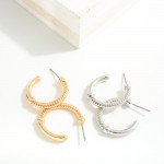 Twisted Metal Hoop Earrings

- Approximately .75" L