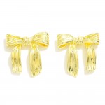 Textured Metal Tone Bow Earrings 

- Approximately .75" L