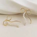 Simple Metal Tone Bow Drop Earrings With Pearl Accent

- Approximately 1.5" L 
